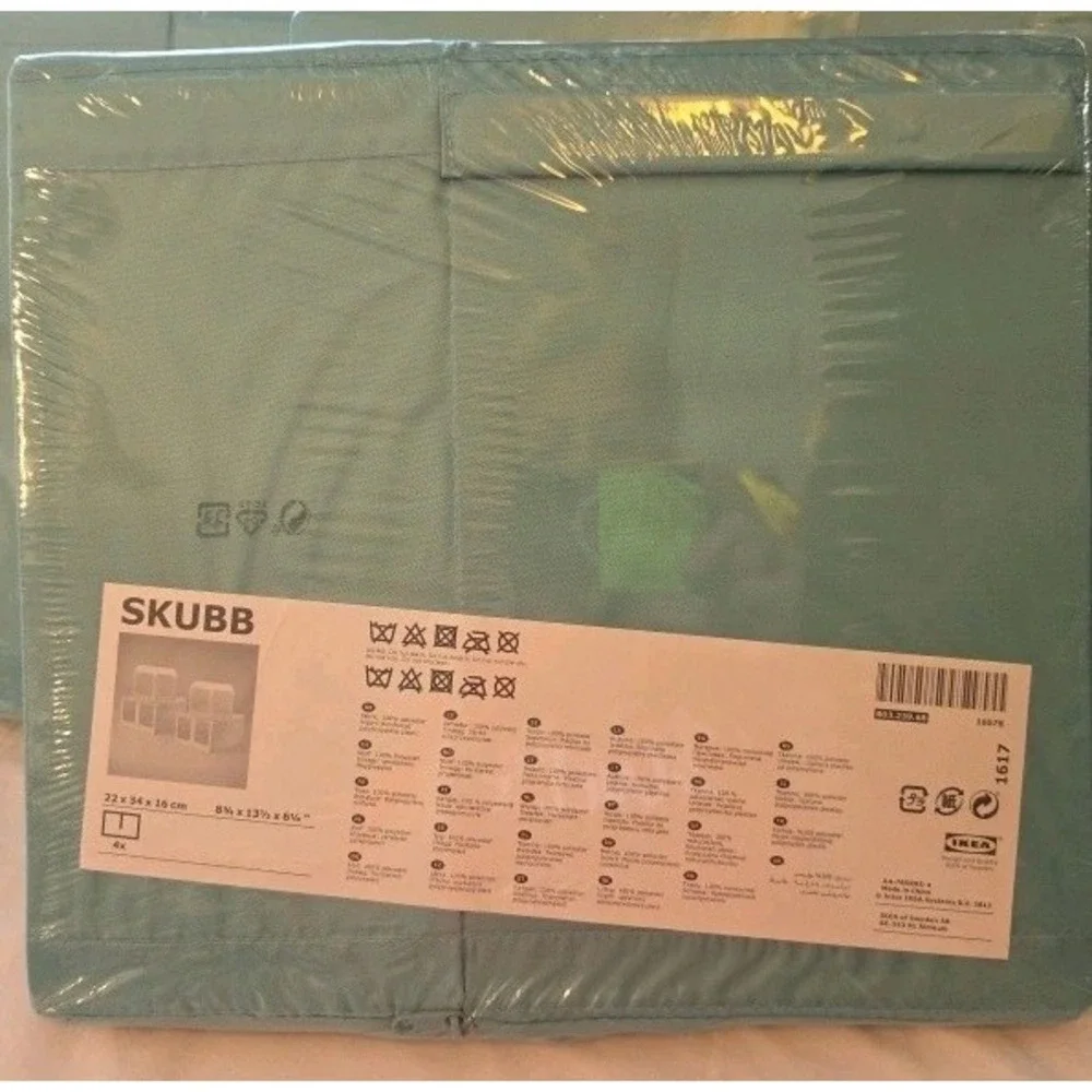 Brand new sealed IKEA SKUBB storage boxes, set of 4. Light teal/mint green color